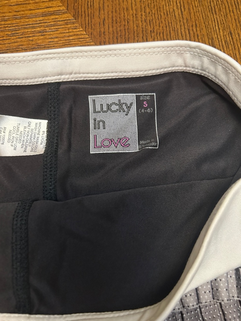 Lucky in Love Women’s Pleated Tiered Athletic Mini Skirt in White and Black - Picture 3 of 4
